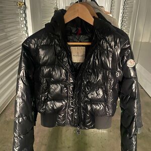Moncler hooded black short puffer coat.